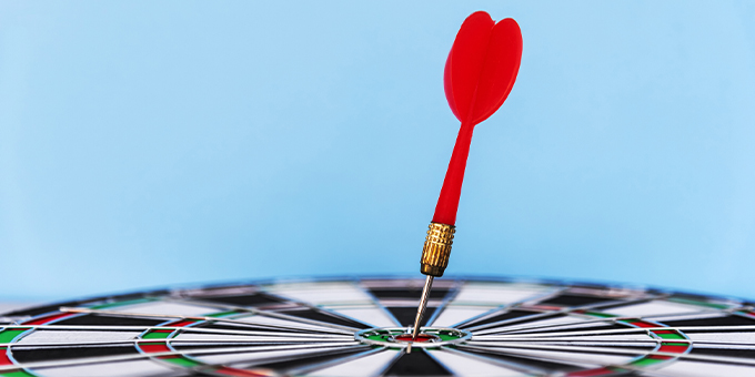 Dart hitting a board